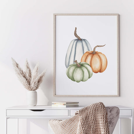 Watercolor pumpkin printable in blue, green, orange colors for boho autumn decor.