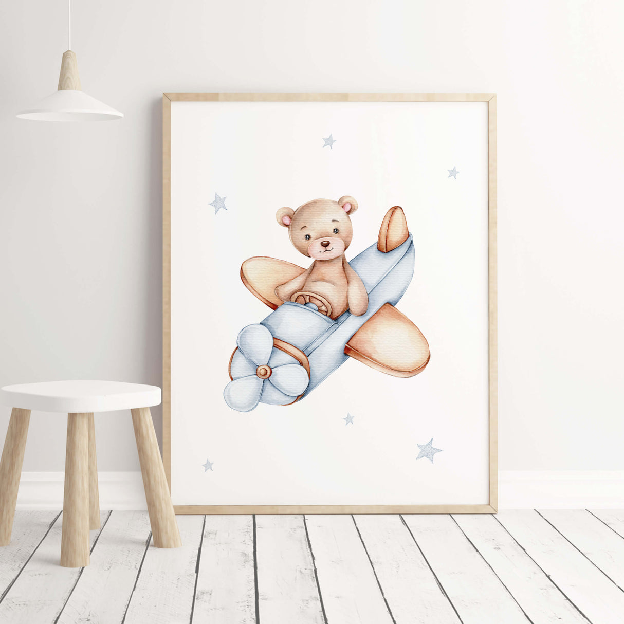 Teddy bear with airplane prints for boys room decor.