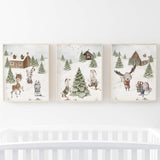 Set of 3 watercolor winter landscape nursery print with woodland animals, pine tree and houses for gender neutral christmas nursery decor.