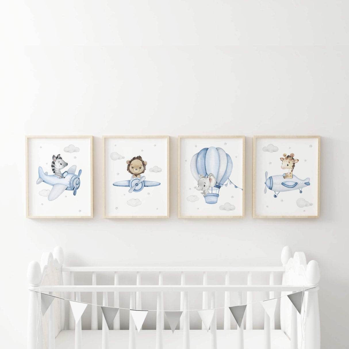 Set of 4 safari animals with airplane and hot air balloon print for toddler and boys room decor in light blue and gray colors.