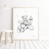 Watercolor teddy bear with airplane print in gray color for gender neutral nursery decor.