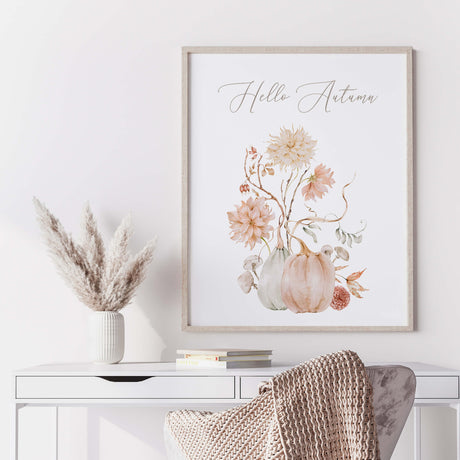 Watercolor fall print with white, peach, pink pumpkin, flowers and hello autumn quote for neutral autumn decor.