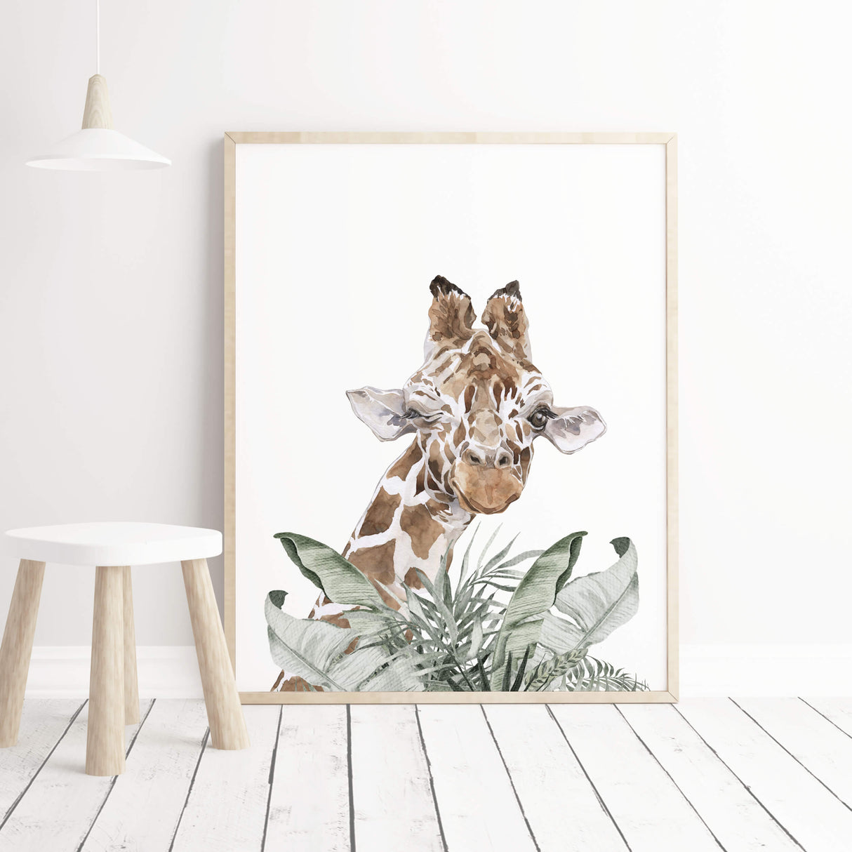 Watercolor giraffe with leaf print for neutral nursery wall decor.