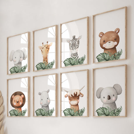 Watercolor woodland and safari animal print with elephant, giraffe, zebra, bear, lion, hippo, bull, koala and leaves print in brown, gray and green colors for neutral nursery decor.